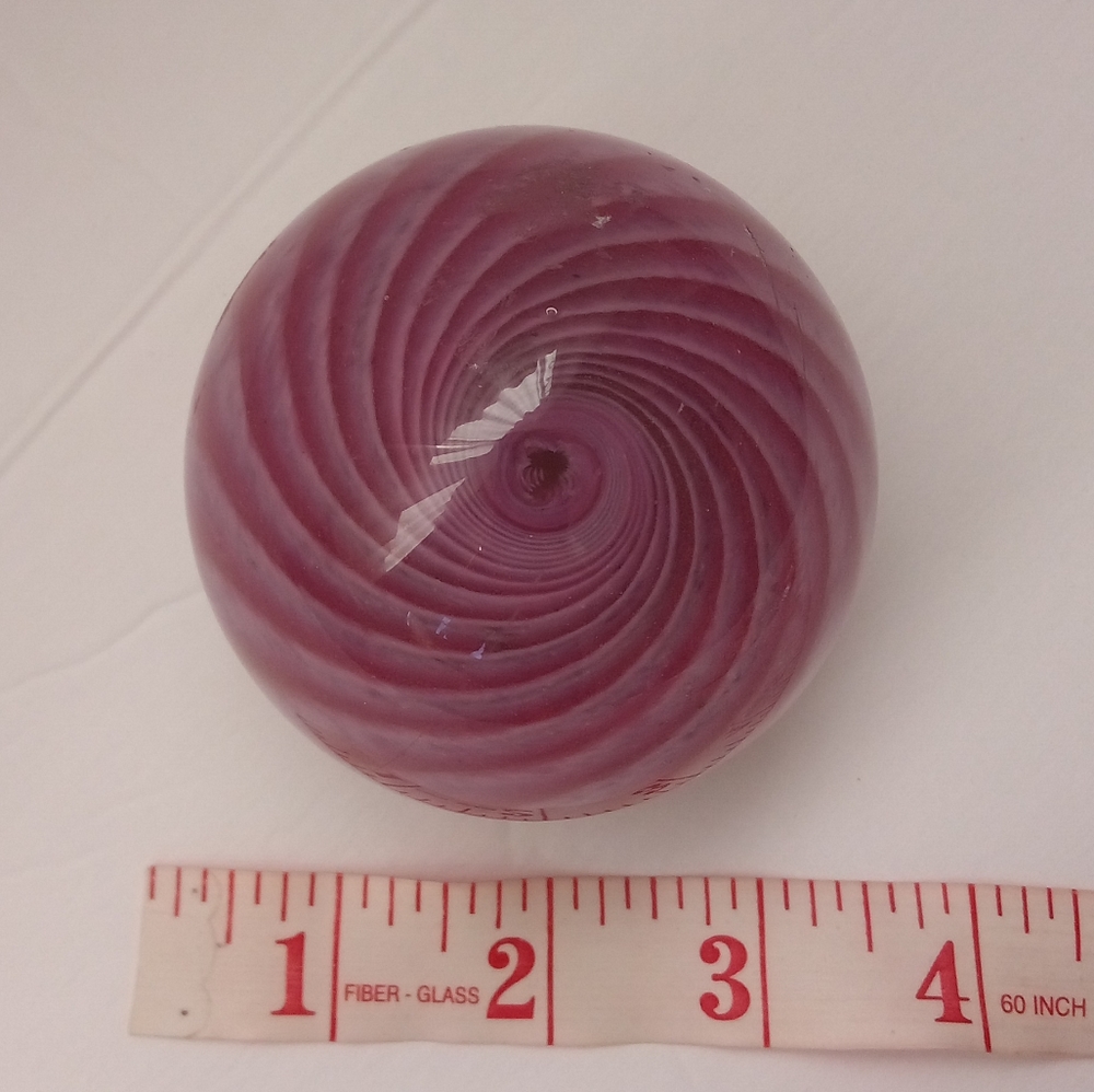 Pink swirl glass paperweight